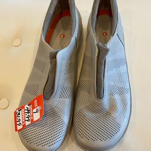 Brand new Clark’s slip on sneakers -size 9